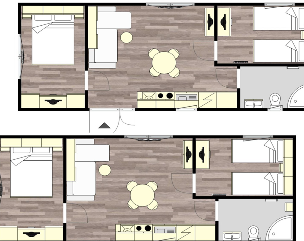 Plattegrond - Dit slim ingerichte chalet heeft een ruime woonkamer / keuken waar alle andere ruimtes aan grenzen. Dit geeft veel overzicht, ruimte én privacy. De slaapkamers liggen namelijk beide aan de uiteindes van het chalet.